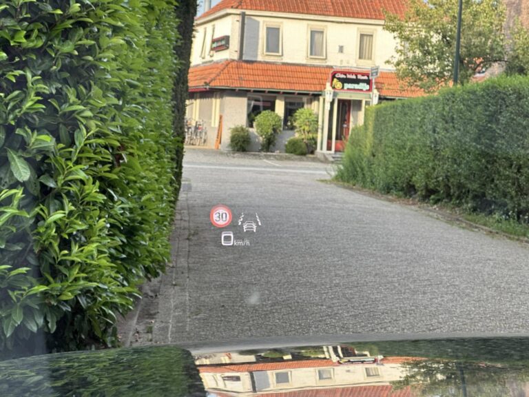 Audi retrofit parking assist Technician installing Audi retrofit hardware on vehiclesensors fitted on bumper